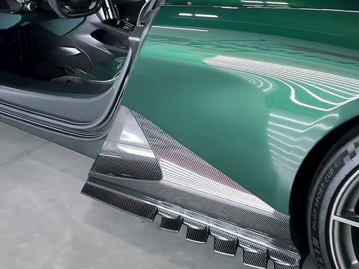 The carbon sill and green flank of the Aston Martin Valhalla, coated in Autobahn Härt